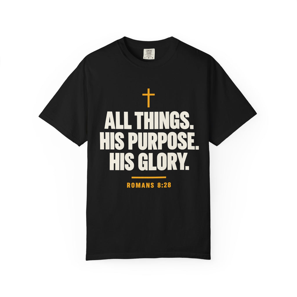 Black Christian T-shirt featuring “All Things. His Purpose. His Glory.” with a cross and Romans 8:28 on a plain white background.