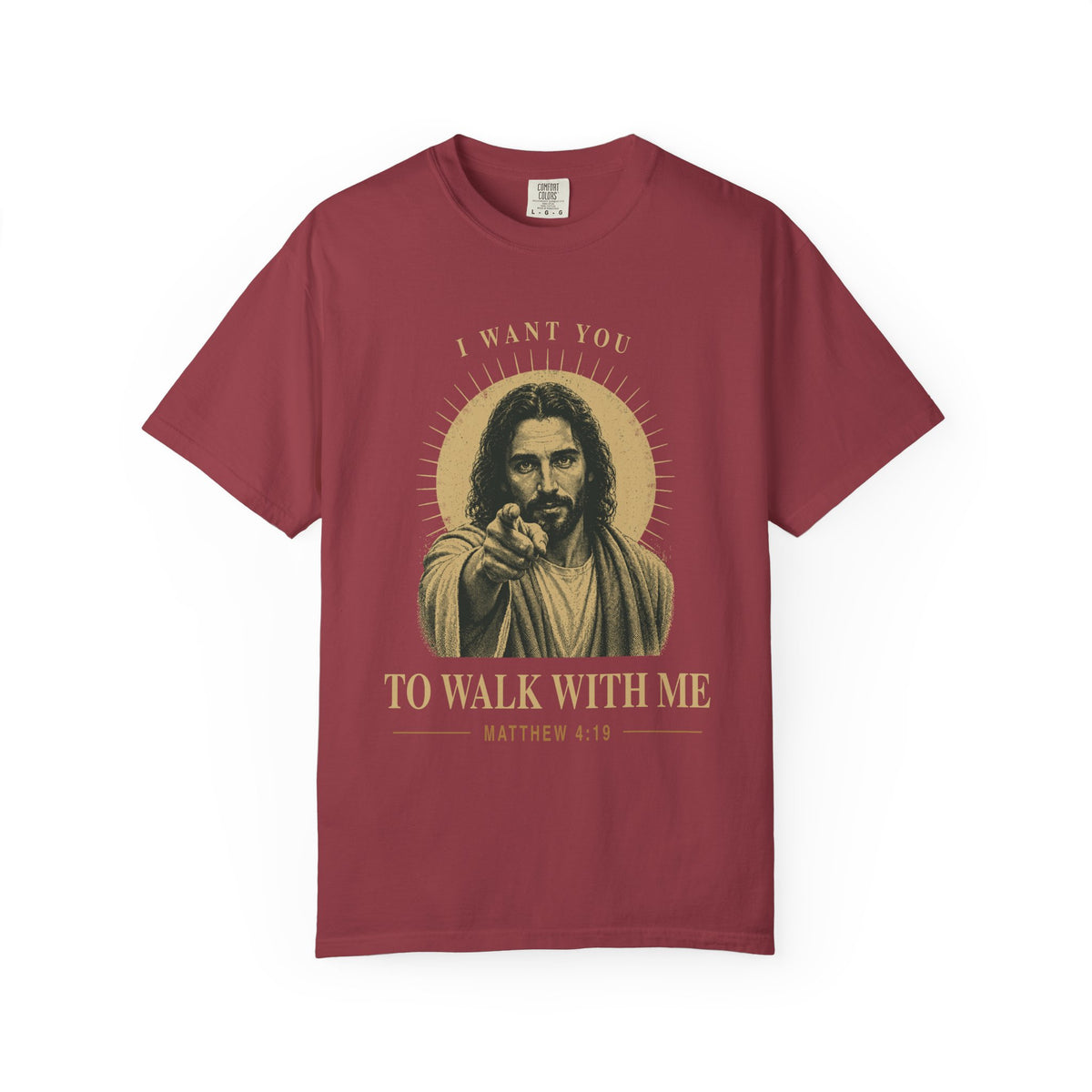 Brick red short-sleeve t-shirt with a graphic print of Jesus pointing, surrounded by a gold halo and the text 'I WANT YOU TO WALK WITH ME MATTHEW 4:19'.