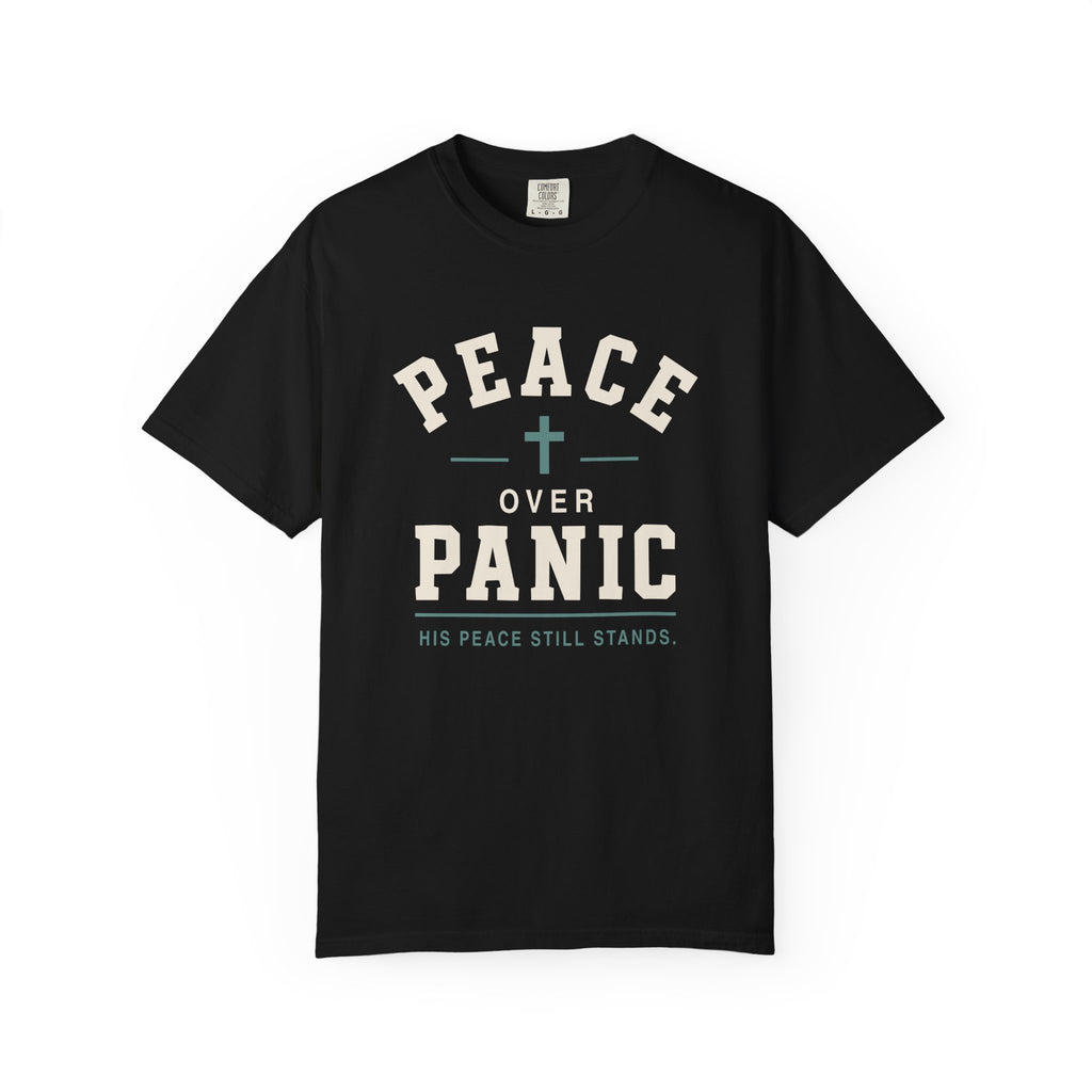 Black Christian T-shirt featuring a “Peace Over Panic—His Peace Still Stands” design with a cross on a plain white background.