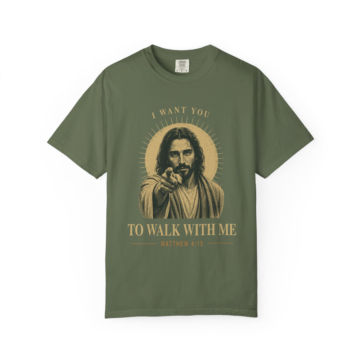 Olive green short-sleeve t-shirt with a graphic print of Jesus pointing, surrounded by a gold halo and the text 'I WANT YOU TO WALK WITH ME MATTHEW 4:19'.