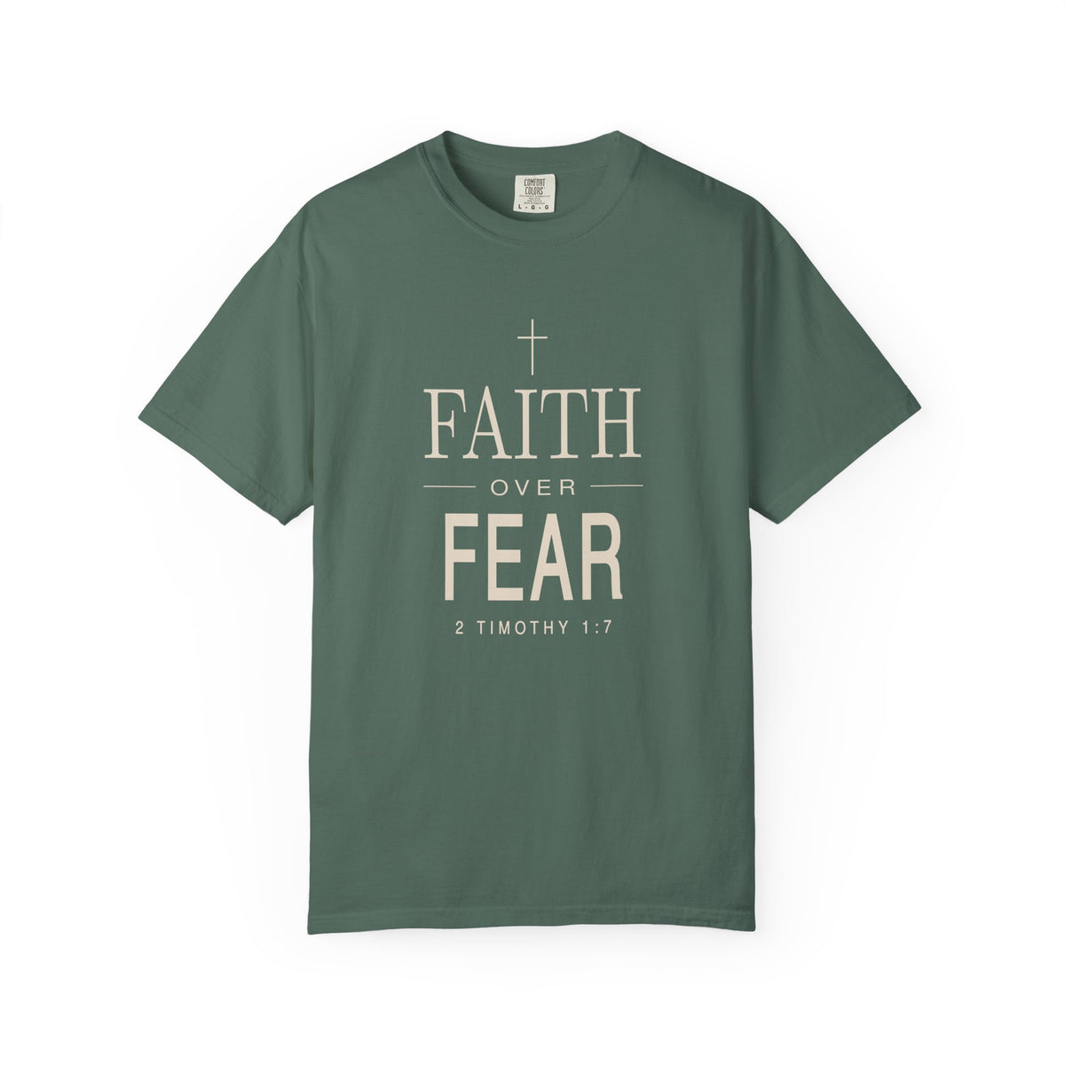 Light green Christian T-shirt featuring a white “Faith Over Fear” design with a cross and 2 Timothy 1:7 on a plain white background.