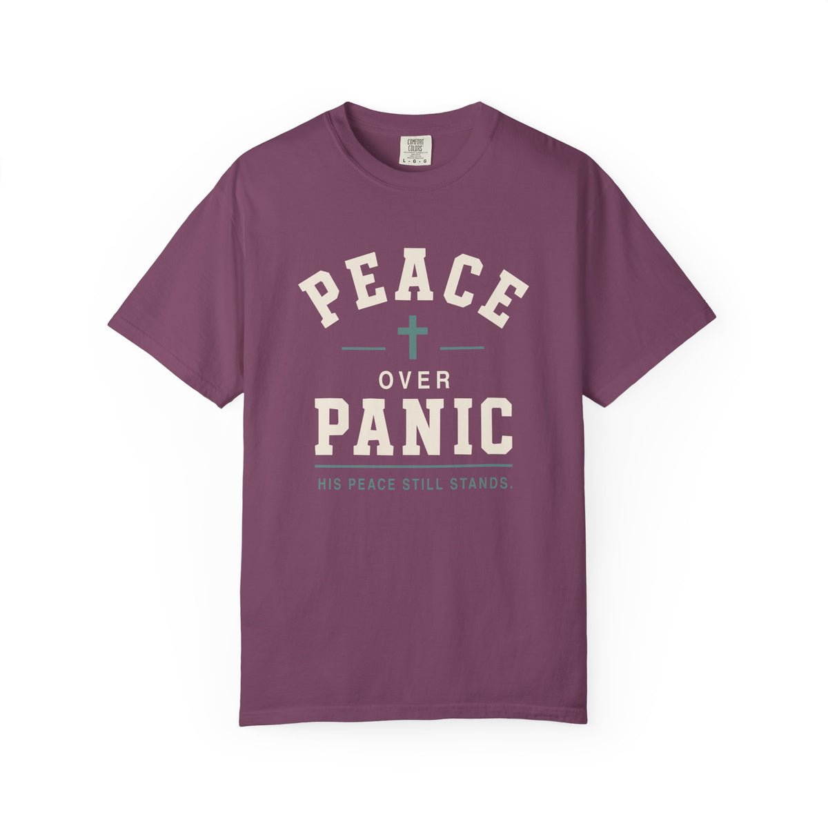 Purple Christian T-shirt featuring a “Peace Over Panic—His Peace Still Stands” design with a cross on a plain white background.