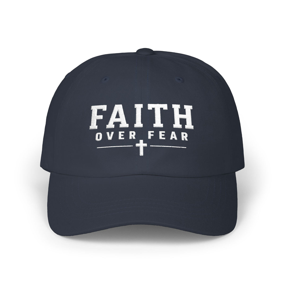 Navy Christian baseball hat embroidered with a white “Faith Over Fear” design and cross on a white background.