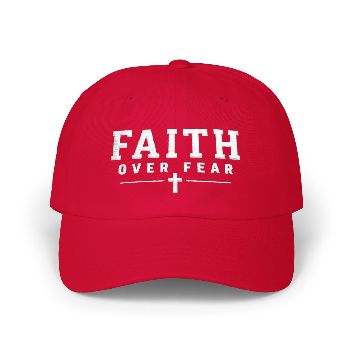 Red Christian baseball hat embroidered with a white “Faith Over Fear” design and cross on a white background.