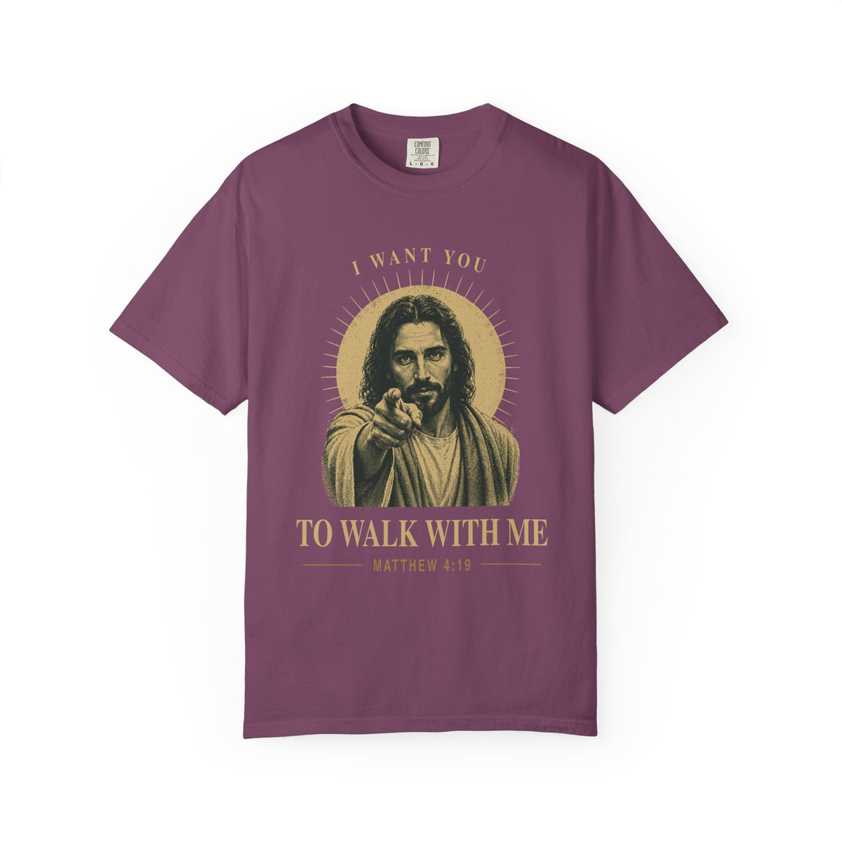 Purple short-sleeve t-shirt with a graphic print of Jesus pointing, surrounded by a gold halo and the text 'I WANT YOU TO WALK WITH ME MATTHEW 4:19'.