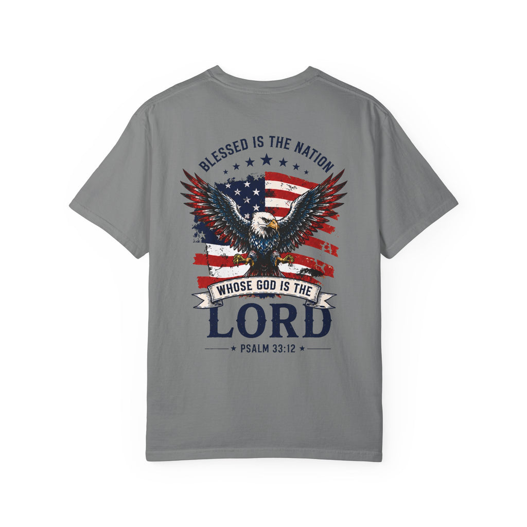 Gray Blessed Is the Nation Christian T-shirt back mockup with patriotic eagle, American flag, and Psalm 33:12 artwork.